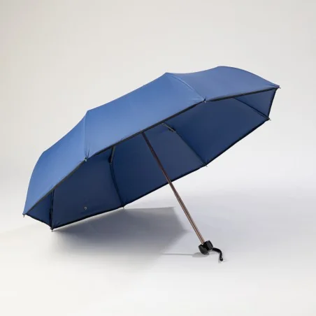 Mini French blue umbrella that opens from the front.