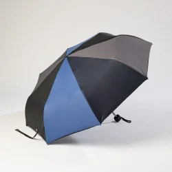 mini blue umbrella opened on the side