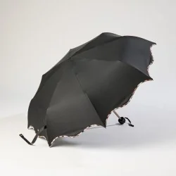 Mini parapluie noir vague ouvert de coté