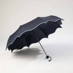 Mini-Regenschirm blau, von vorne geöffnet
