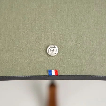 Folding umbrella in khaki detail