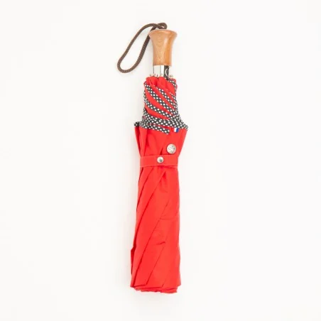 parapluie pliant rouge à pois, fermé