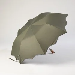 khaki folding umbrella with polka dots, opens sideways