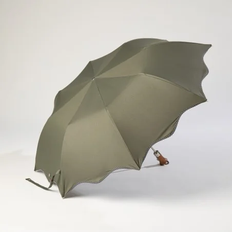 khaki folding umbrella with polka dots, opens sideways