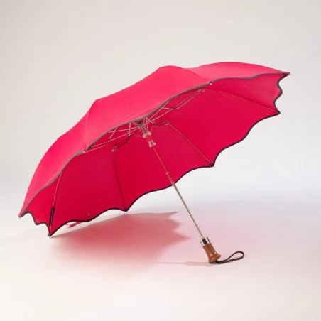 Parapluie pliant rose, ouvert de face