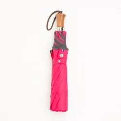 Pink folding umbrella, closed
