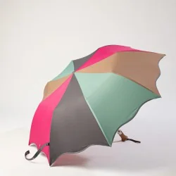 multicoloured folding umbrella opened sideways