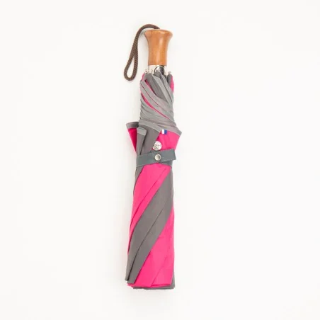 grey and pink folding umbrella, closed