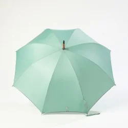 Seafoam green city umbrella, open