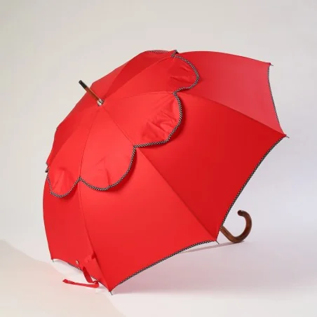 Windproof umbrella, red biding with polka dots, side opening