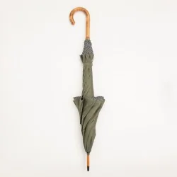 Windproof umbrella in khaki with polka dot biding, closed