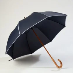 Navy blue walking umbrella with sailor-style trim, opens from the front