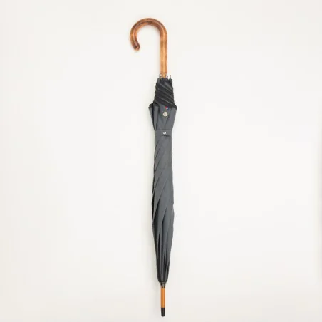 Grey walking umbrella with black trim, closed