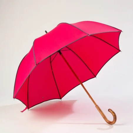 Pink walking umbrella with grey trim, front opening