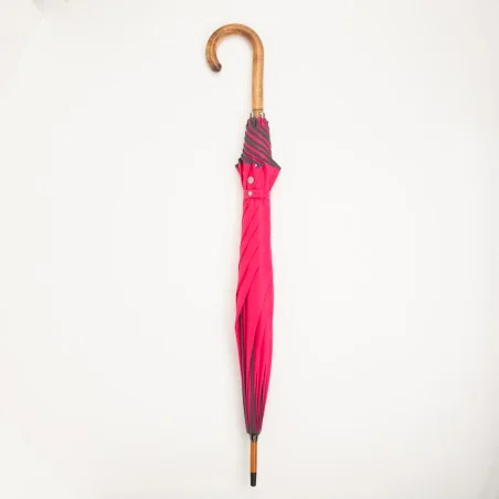 Pink walking umbrella with grey trim, closed
