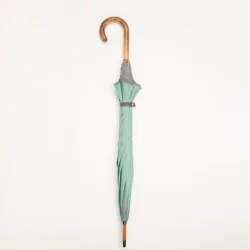 Seafoam green walking umbrella with grey trim, closed