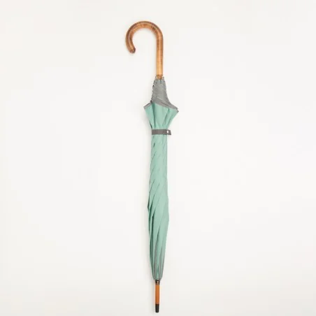 Seafoam green walking umbrella with grey trim, closed