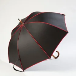 Black walking umbrella with red trim, side opening