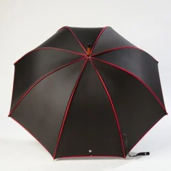 Black walking umbrella with red trim, open