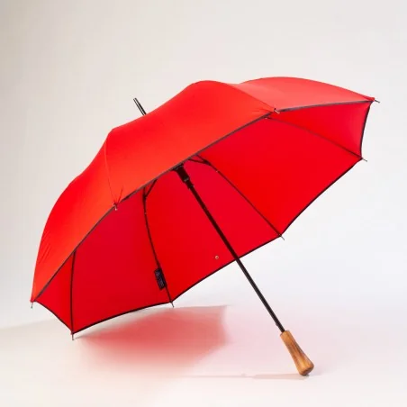 Red automatic umbrella, front view when open