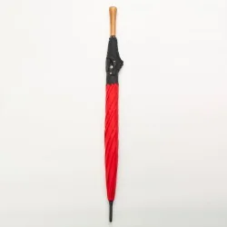 Red golf umbrella, closed