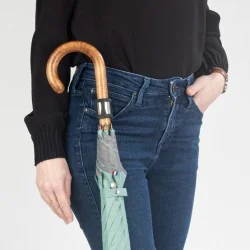 Umbrella holder in a pocket