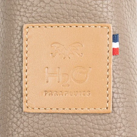 Logo H2o Regenschirme auf der Lederscheide Musgo und Desierto