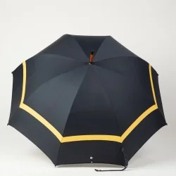 Navy blue and yellow walking umbrella, open
