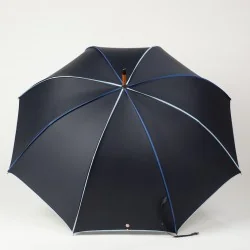 Navy blue walking umbrella trimmed with shades of blue, open