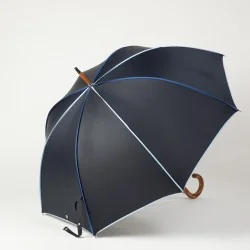 Parapluie canne bleu marine gansé de nuances de bleu, ouvert de coté