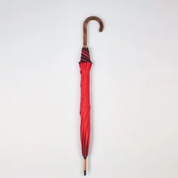Stockschirm mit Stiel in Rot und schwarzer Einfassung, geschlossen