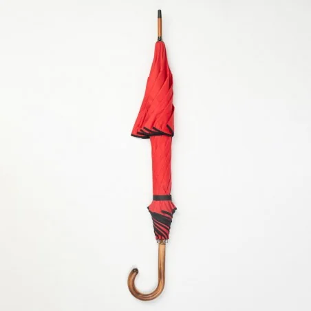 Windproof umbrella, red with black biding, closed