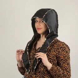 Black rain hood with beige tartan trim, side view