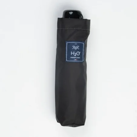 small black umbrella in its case