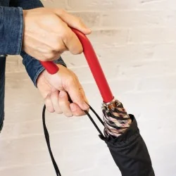 Cane umbrella in textile cover