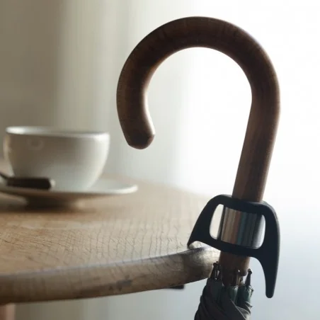 umbrella stand, attached to a table