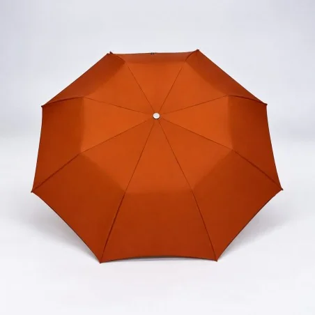 open terracotta folding umbrella